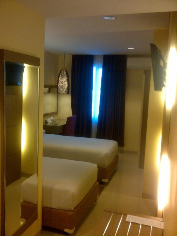 Amans Hotel Ambon Quarto foto