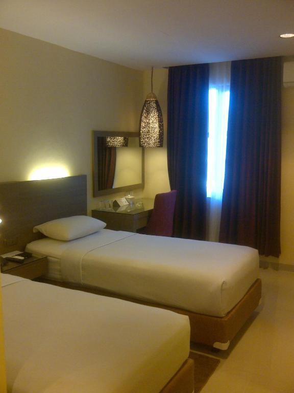 Amans Hotel Ambon Quarto foto